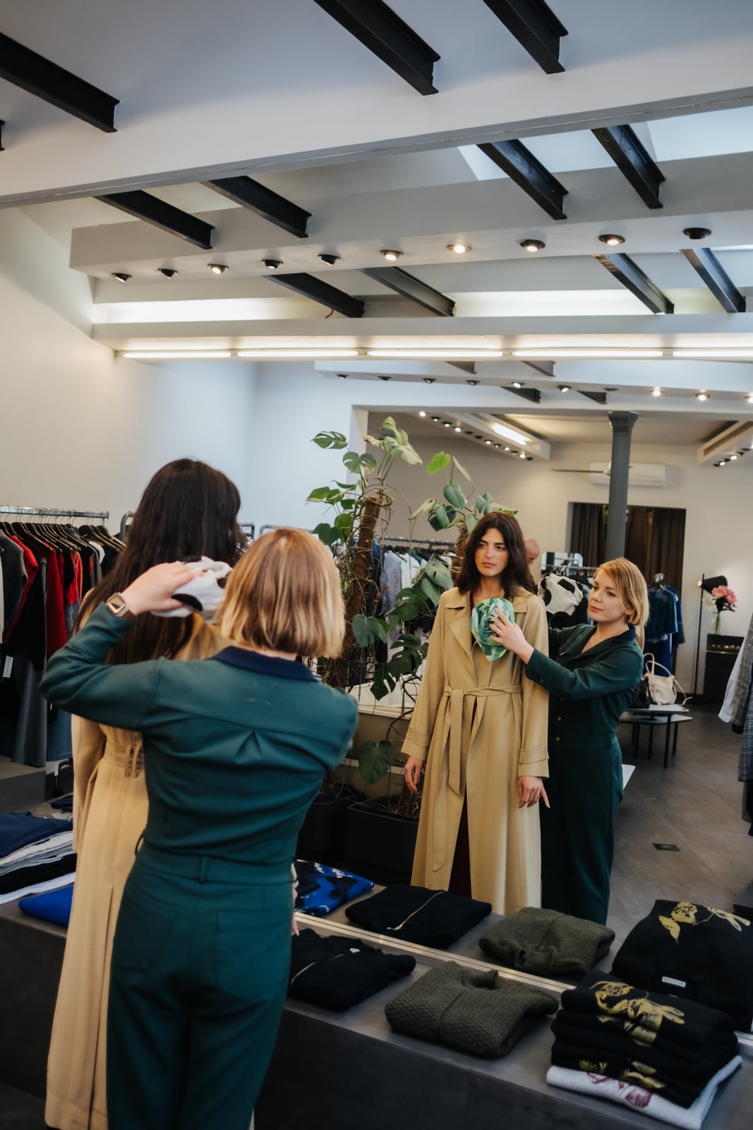 Clients and stylists working together in a private Parisian styling studio